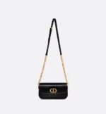 the rounded flap with delicate curves is punctuated by an antique gold-finish metal CD clasp inspired by the seal of a Christian Dior perfume bottle. The design is completed by other details