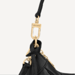 or cross-body with its removable strap.