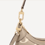 the better to highlight the delicate color contrast of dove gray and cream. A graceful companion for any ensemble