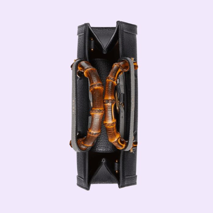 the Gucci Diana continues to combine recognizable elements of the House with the bamboo handles and Double G hardware. Crafted from black leather