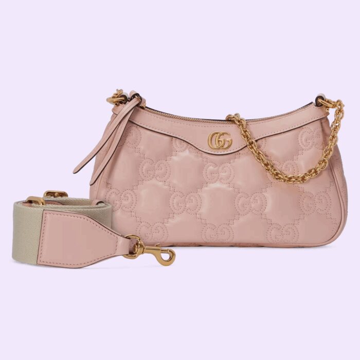 including this pink leather bag. The Double G hardware decorates the front