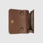 rectangular shape in GG Supreme canvas. The style can be used as a phone bag.