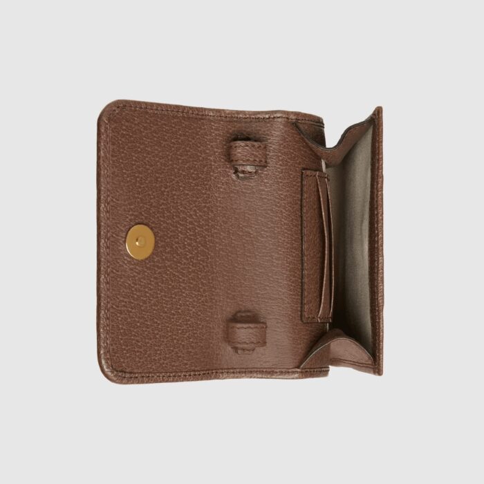 rectangular shape in GG Supreme canvas. The style can be used as a phone bag.