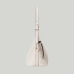 matching Gucci's contemporary vision. Presented here in white leather