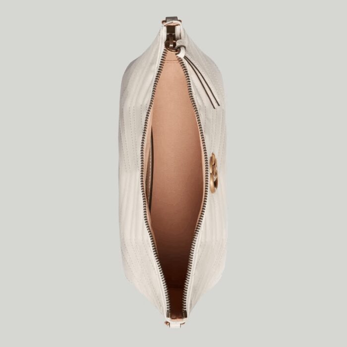 it's further enriched with antique gold-toned details.