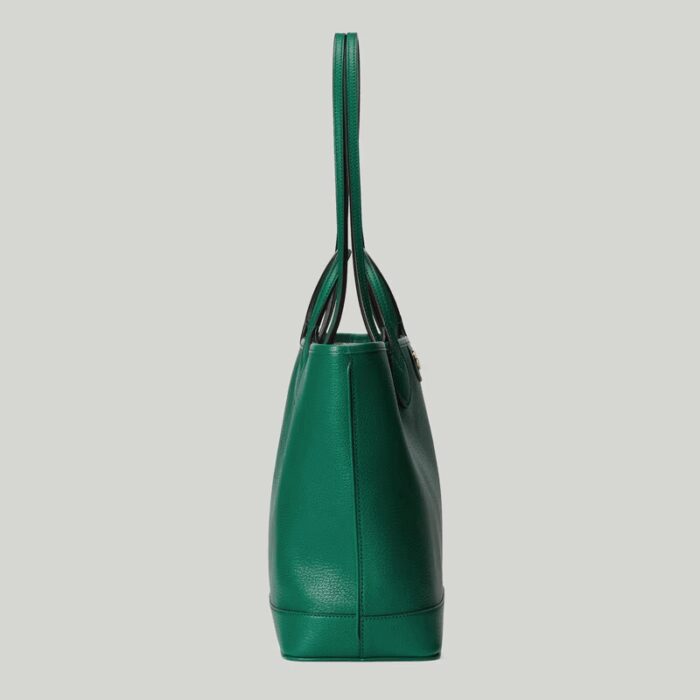 providing versatile accessories to complete any look. Two handles transform this tote bag