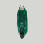 allowing it to be styled either as a shoulder bag or top handle. The Double G remains integral to the design