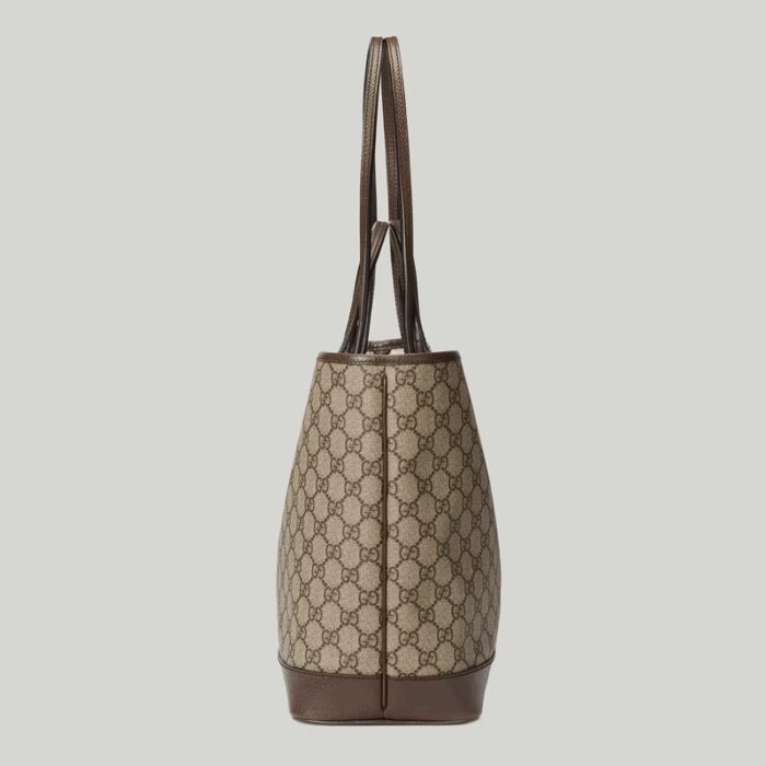 providing versatile accessories to complete any look. Two handles transform this tote bag