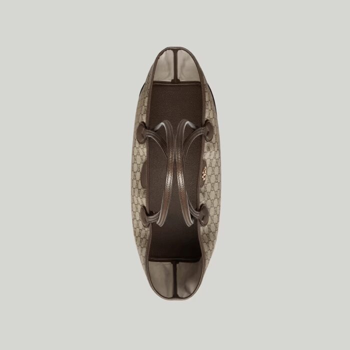 allowing it to be styled either as a shoulder bag or top handle. The Double G remains integral to the design