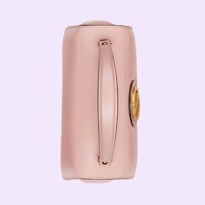 in tonal leather or gold-toned metal chain.