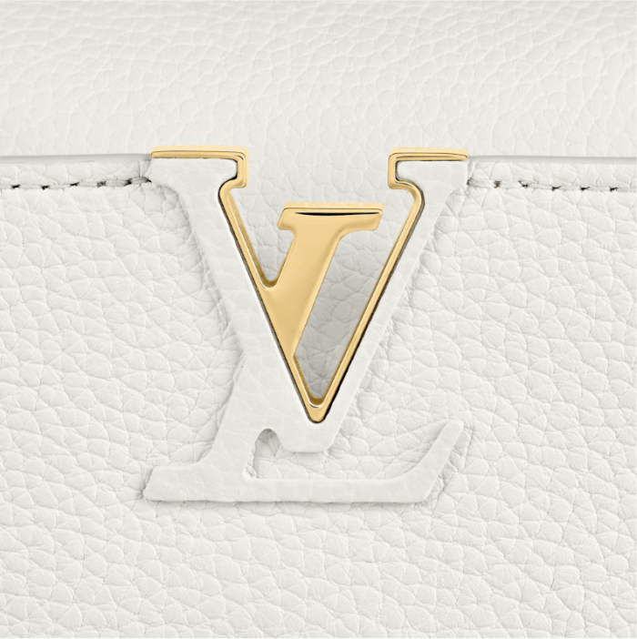 this charming model can be carried by hand or worn cross-body on its detachable strap. First launched in 2013