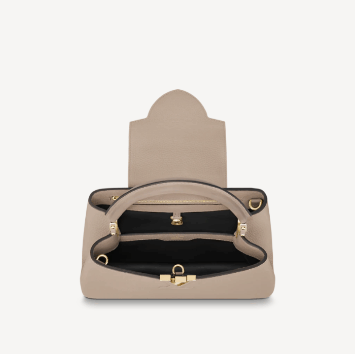 the Capucines MM handbag was first introduced in 2013. Superbly crafted from full-grain Taurillon leather