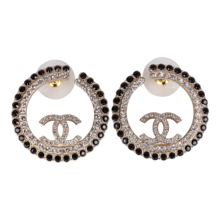 These hoop earrings are in the signature CC logo with black and clear crystals.