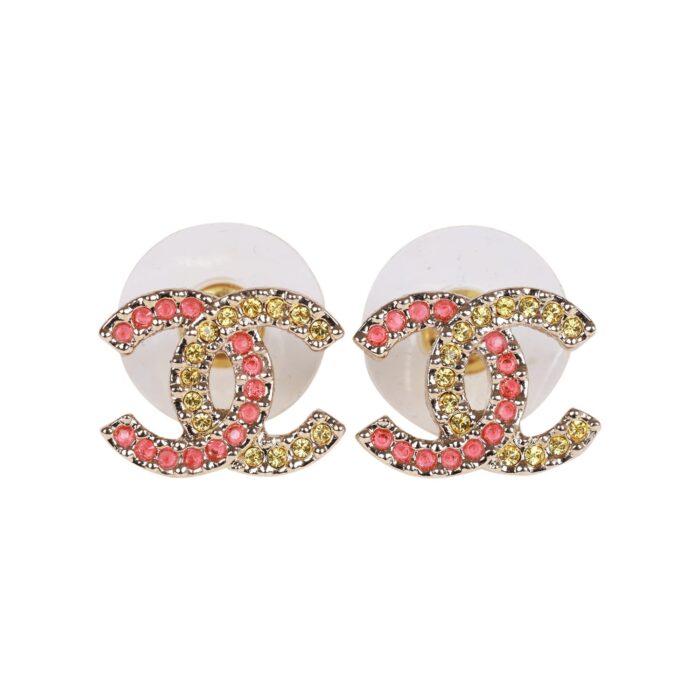 These CC logo earrings are in?gold tone metal with pink and?gold crystals.