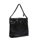 CHANEL on the front in black metal