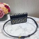 it offers a compact size that is perfect for carrying your essentials.Crafted from beautiful blue Dior Oblique jacquard