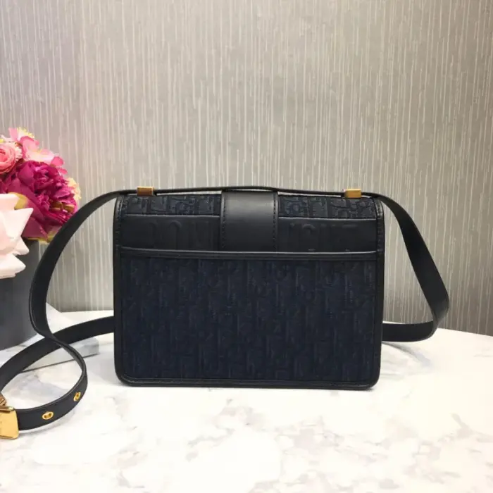 this bag is the perfect size for all your essentials.The 30 Montaigne flap bag showcases the iconic blue Dior Oblique jacquard canvas and features a stylish CD clasp. The jewelry details in gold-tone metal add a touch of luxury to the overall design.Crafted with attention to detail