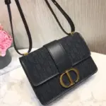 and a soft lambskin lining. The combination of these materials not only enhances the durability of the bag but also adds a luxurious feel to it.For added convenience