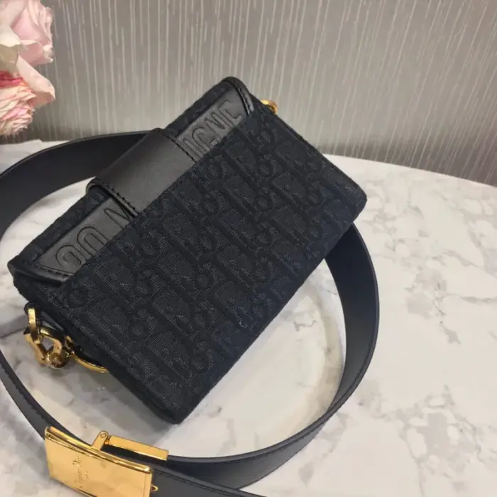 adding a touch of sophistication to the design.Practicality meets style with a back pocket and interior pocket