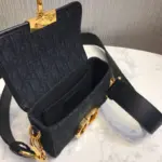 providing ample storage space for your essentials. The bag also comes with an adjustable and removable large leather shoulder strap