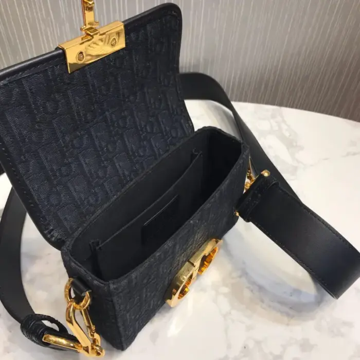 providing ample storage space for your essentials. The bag also comes with an adjustable and removable large leather shoulder strap
