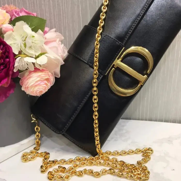 adding a touch of elegance to its design. It also includes a convenient back pocket for extra storage space.Versatility is key with this bag