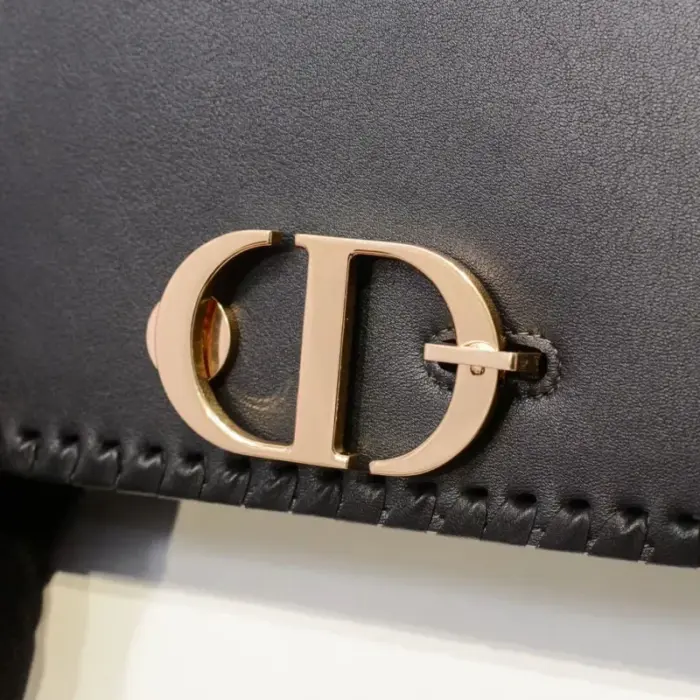this bag exudes luxury and elegance. The flap design closure adds a touch of sophistication