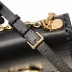 while the iconic ‘CD’ hook clasp is a symbol of timeless style. On the back of the bag
