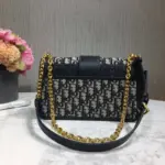 this bag exudes elegance and timelessness. The flap closure features a one-of-a-kind shiny antique gold ‘CD’ clasp