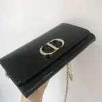 this wallet offers convenience and style.The gold finish metal adds a luxurious touch