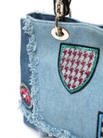 sans-serif; font-size: 16px; background-color: #ffffff;">Christian Dior's pre-owned D-Light denim handbag