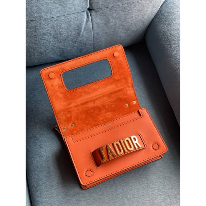 sans-serif; font-size: 15px; background-color: #ffffff;">This is a Replica CHRISTIAN DIOR Calfskin J'Adior Chain Flap Bag in Orange. This chic shoulder bag is crafted of soft calfskin leather in burnt orange. The bag features black resin trim