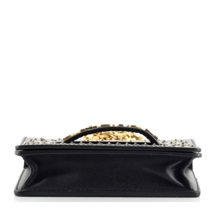 crafted in black embellished leather