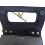 features a slot handclasp with metal plated J'ADIOR signature