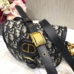 this bag comes with a dust bag for added protection and storage. Embrace the essence of Dior’s iconic 30 Montaigne collection with this stunning accessory. Elevate your style and make a statement with the Christian Dior Small Dior Bobby Bag in Blue Dior Oblique Jacquard M9317.