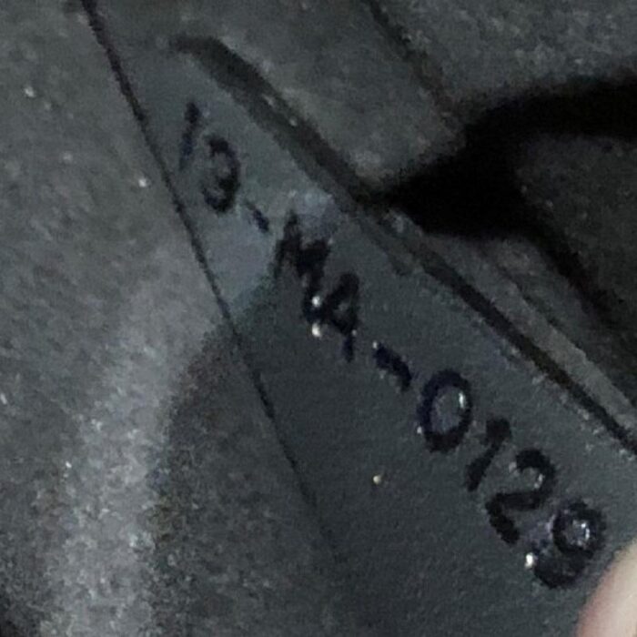 features a chain link strap