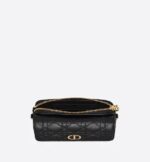 sans-serif; background-color: #f6f6f6;">The Dior Caro pouch is a practical and elegant creation. Crafted in black supple calfskin with Cannage stitching