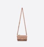 sans-serif; background-color: #f6f6f6;">The Dior Caro pouch is a practical and elegant creation. Crafted in blush supple calfskin with Cannage stitching