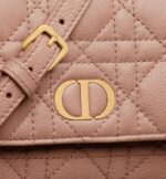 while it may be carried crossbody with its removable and adjustable shoulder strap