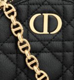 may be worn crossbody and is ideal for day or evening wear.