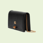 sans-serif; font-size: 16px; background-color: #ffffff;">This Diana mini bag is presented in black leather. With a slim silhouette