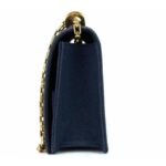 on the shoulder or across the body. Suede interior with several compartments In perfect condition