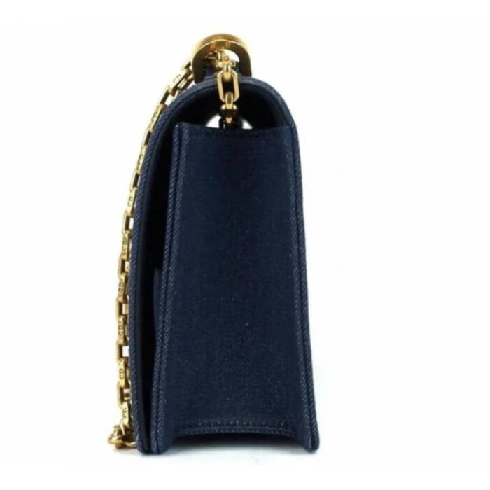 on the shoulder or across the body. Suede interior with several compartments In perfect condition