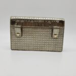 and polished gold hardware. The flap opens to a black suede interior with pockets and four card slots. Base length: 7.50 in Height: 4.75 in Width: 1.75 in Drop: 22.50 in Drop: 14.00 in