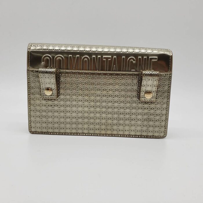 and polished gold hardware. The flap opens to a black suede interior with pockets and four card slots. Base length: 7.50 in Height: 4.75 in Width: 1.75 in Drop: 22.50 in Drop: 14.00 in