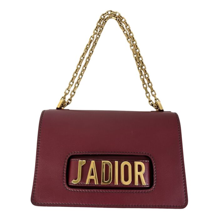 sans-serif; font-size: 16px; white-space: pre-wrap;">“J'adior” leather bag in burgundy/garnet leather. Suede interior. With golden fittings. In perfect condition