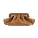 the vintage-inspired Boursicot pouch makes a unique statement. Crafted in the House’s signature Monogram canvas