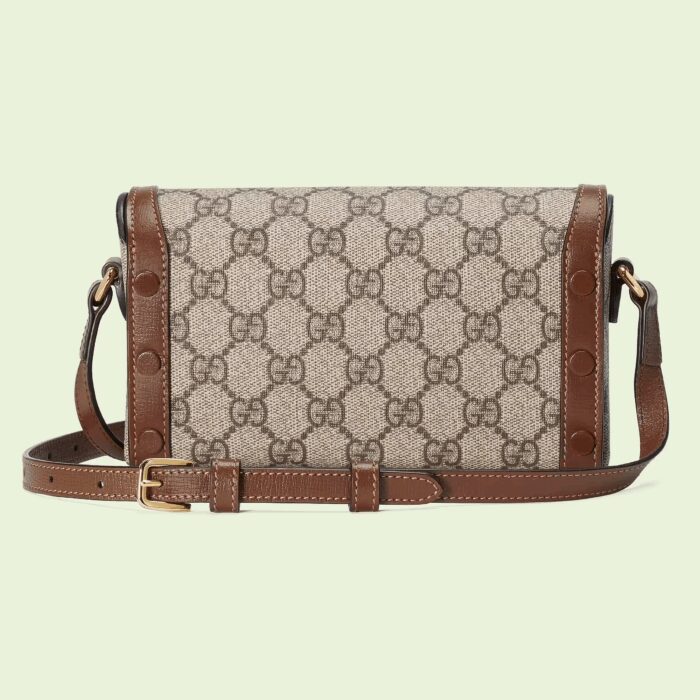 classic elements from the House's archives are reintroduced. A part of the Gucci Horsebit 1955 universe