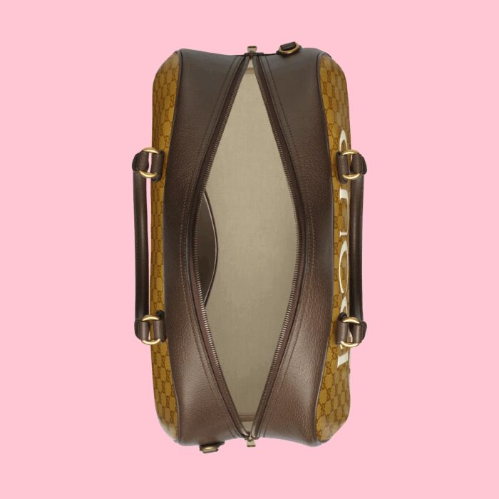 this large duffle bag features the 'Gucci adidas' and Trefoil print. adidas and Gucci venture into a collection