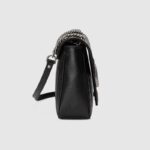 the shoulder bag is reimagined with a new geometric take on its signature finish that combines vertical and diagonal motifs.